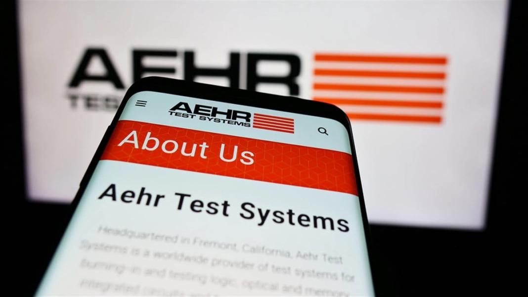 Stuttgart, Germany - 04-28-2024: Mobile phone with website of US semiconductor testing company Aehr Test Systems in front of business logo. Focus on top-left of phone display. — Stock Editorial Photography